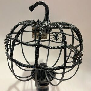 Pretty cool black rhinestone & metal skeleton Halloween pumpkin with spiders.